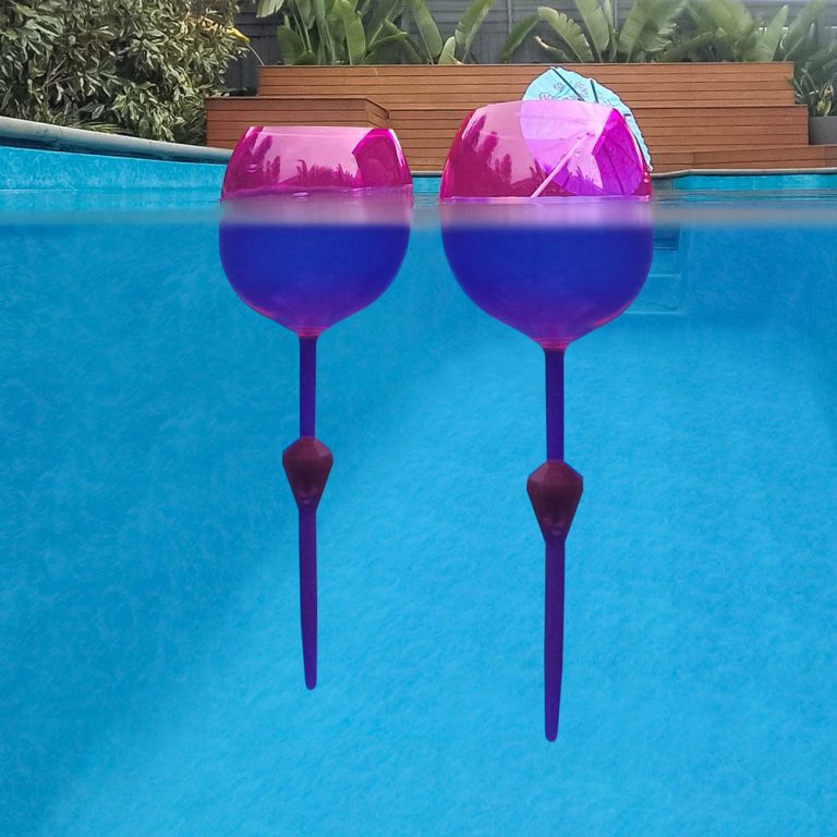 lifestyle example of Ecommerce Product Photography with 2 pink wine glasses floating in pool in Melbourne